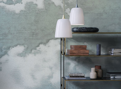Modern interior design with pendant lights and shelves against a vintage cloud wallpaper